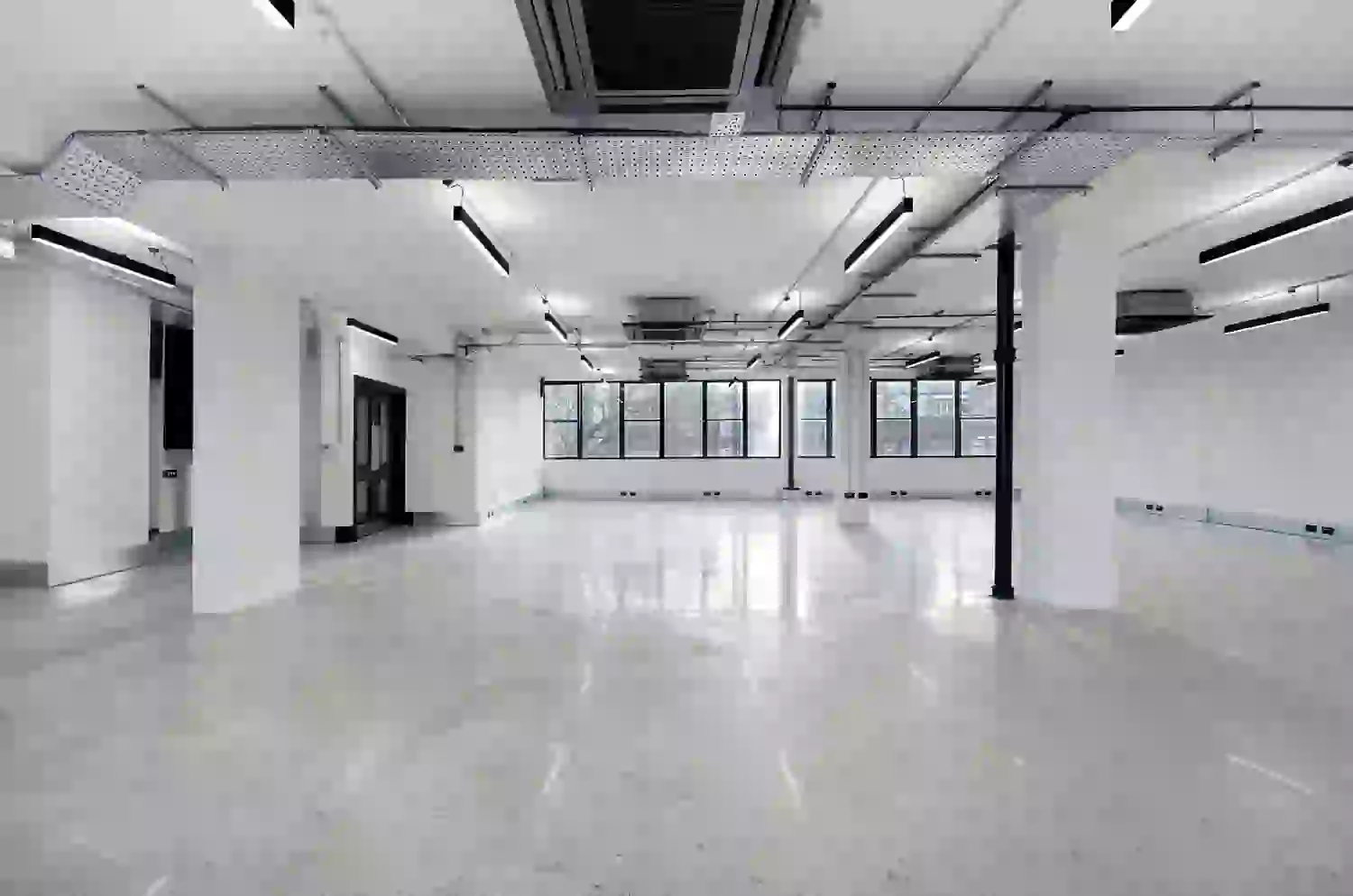 Office space to rent at E1 Studios, 3-15 Whitechapel Road, London, unit NH.207, 2015 sq ft (187 sq m).