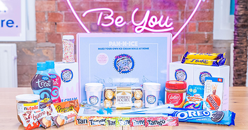 The contents of an ice cream roll home box kit on a table.
