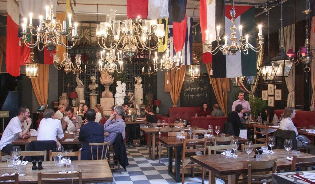 People sitting inside Brunswick House in Vauxhall.