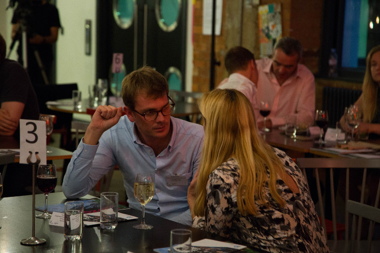 People talking at the wellness at work event at the Workspace® property The Pill Box.