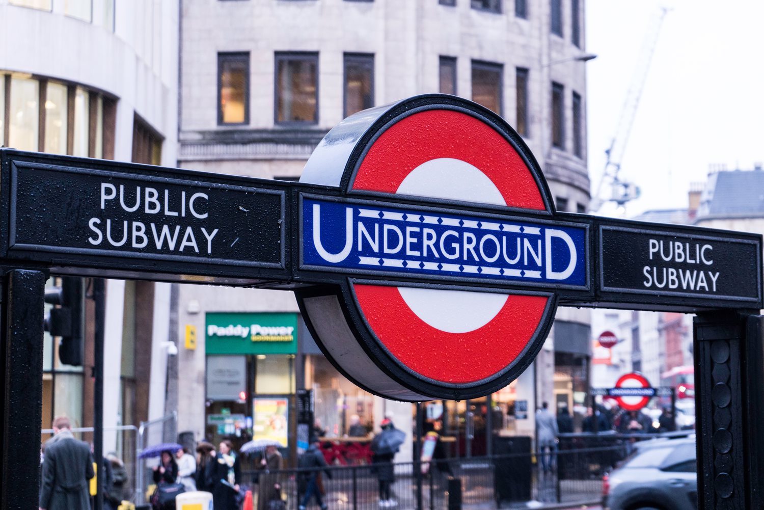 Underground sign on a London street corner.