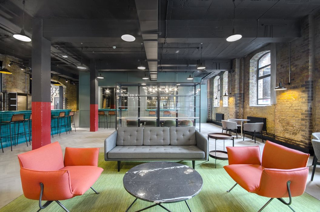 Inside of the China Works property in Vauxhall with brightly coloured seating area.
