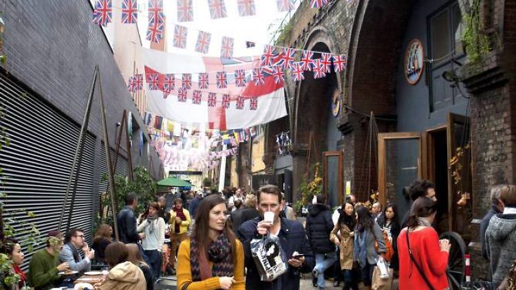 People enjoying Maltby Street Market: