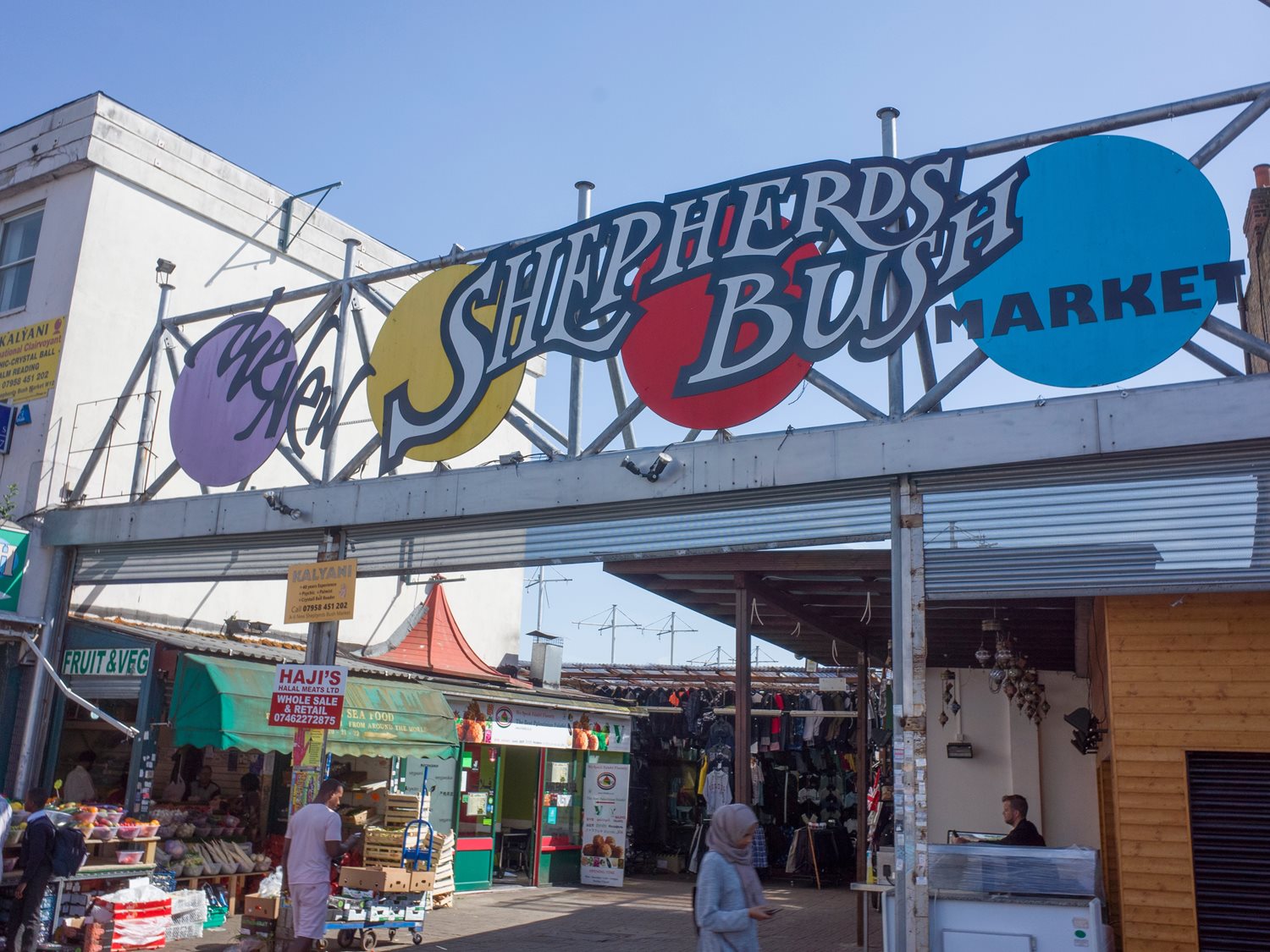 People shopping in Shepherds Bush Market.