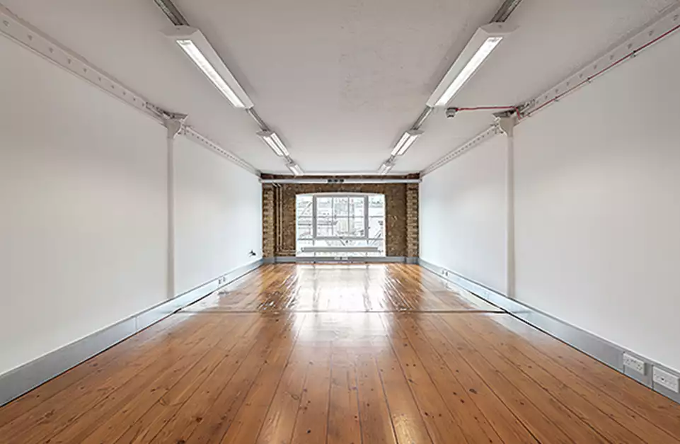 Office space to rent at Clerkenwell Workshops, 27/31 Clerkenwell Close, Farringdon, London, unit CS.405, 405 sq ft (37 sq m).