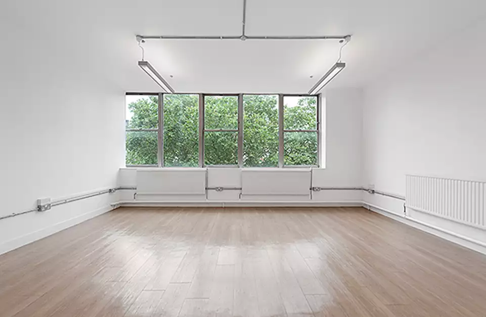 Office space to rent at E1 Studios, 3-15 Whitechapel Road, London, unit NH.406, 325 sq ft (30 sq m).