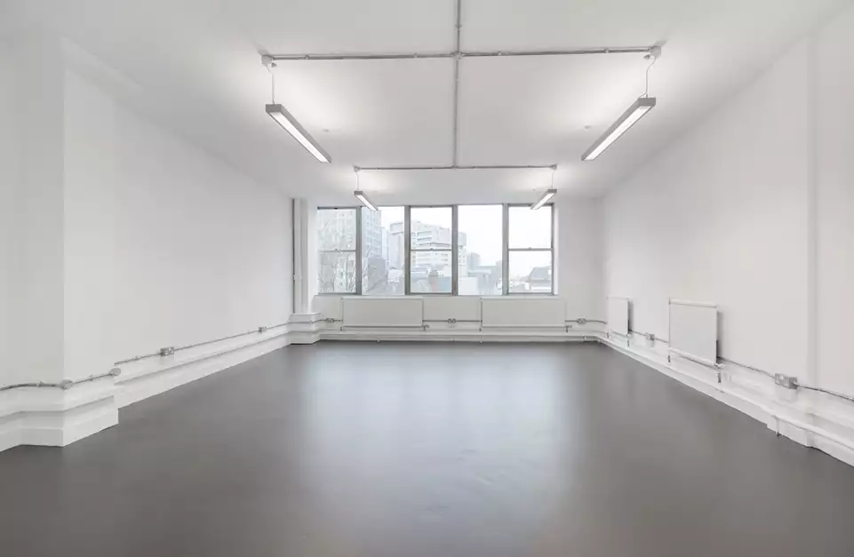 Office space to rent at E1 Studios, 3-15 Whitechapel Road, London, unit NH.408, 465 sq ft (43 sq m).
