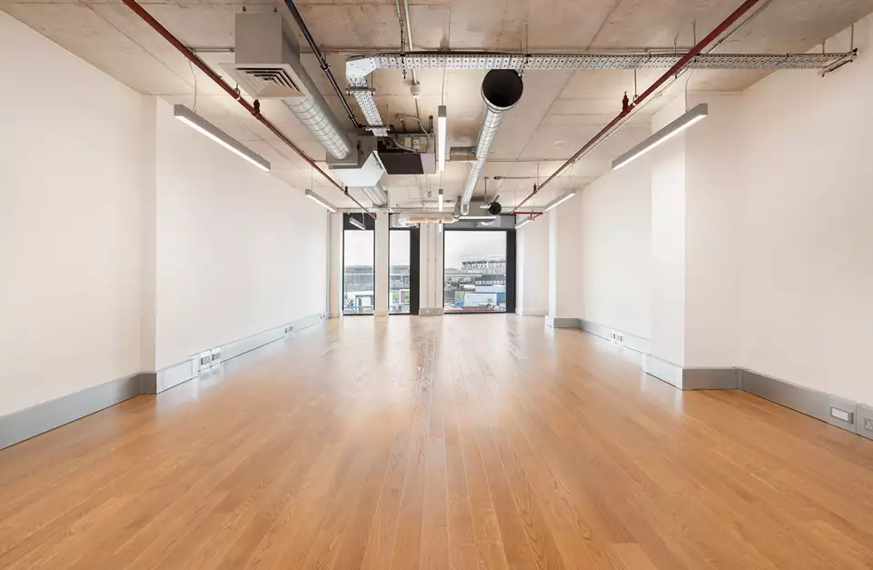 Office space to rent at Mirror Works, 12 Marshgate Lane, London, unit MI.112, 710 sq ft (65 sq m).