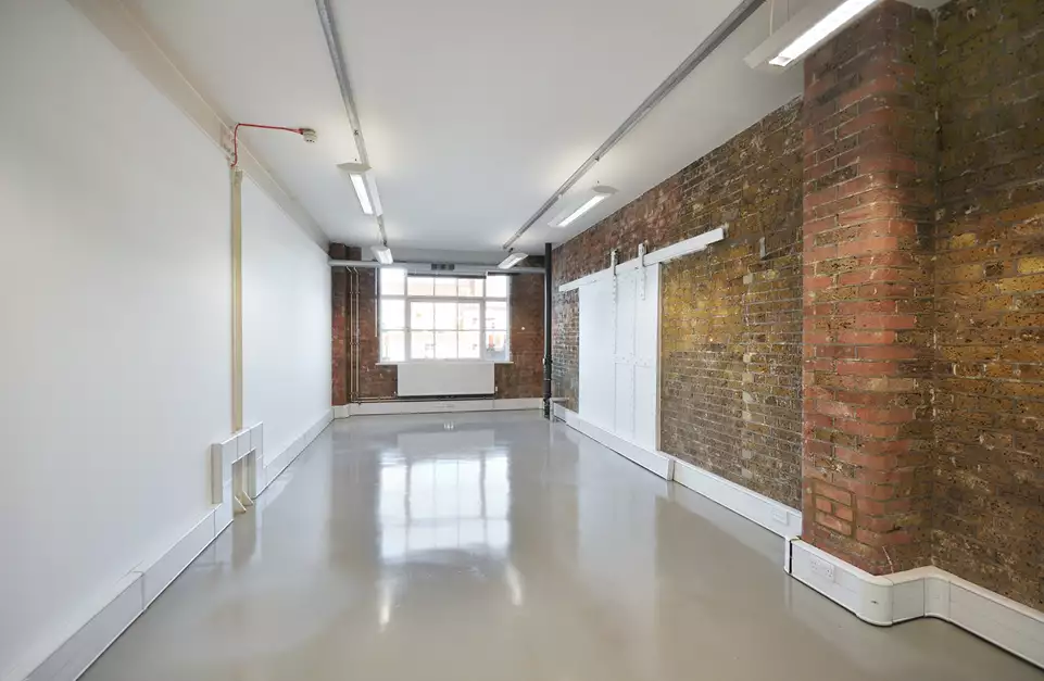 Office space to rent at Clerkenwell Workshops, 27/31 Clerkenwell Close, Farringdon, London, unit CS.505, 392 sq ft (36 sq m).