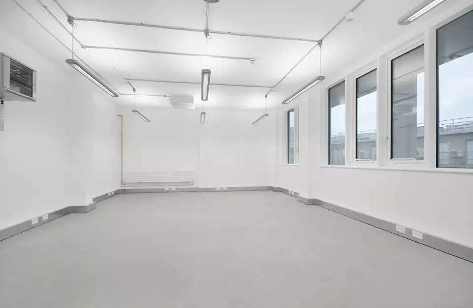 Office space to rent at The Light Bulb, 1 Filament Walk, Wandsworth, London, unit LU.406, 577 sq ft (53 sq m).